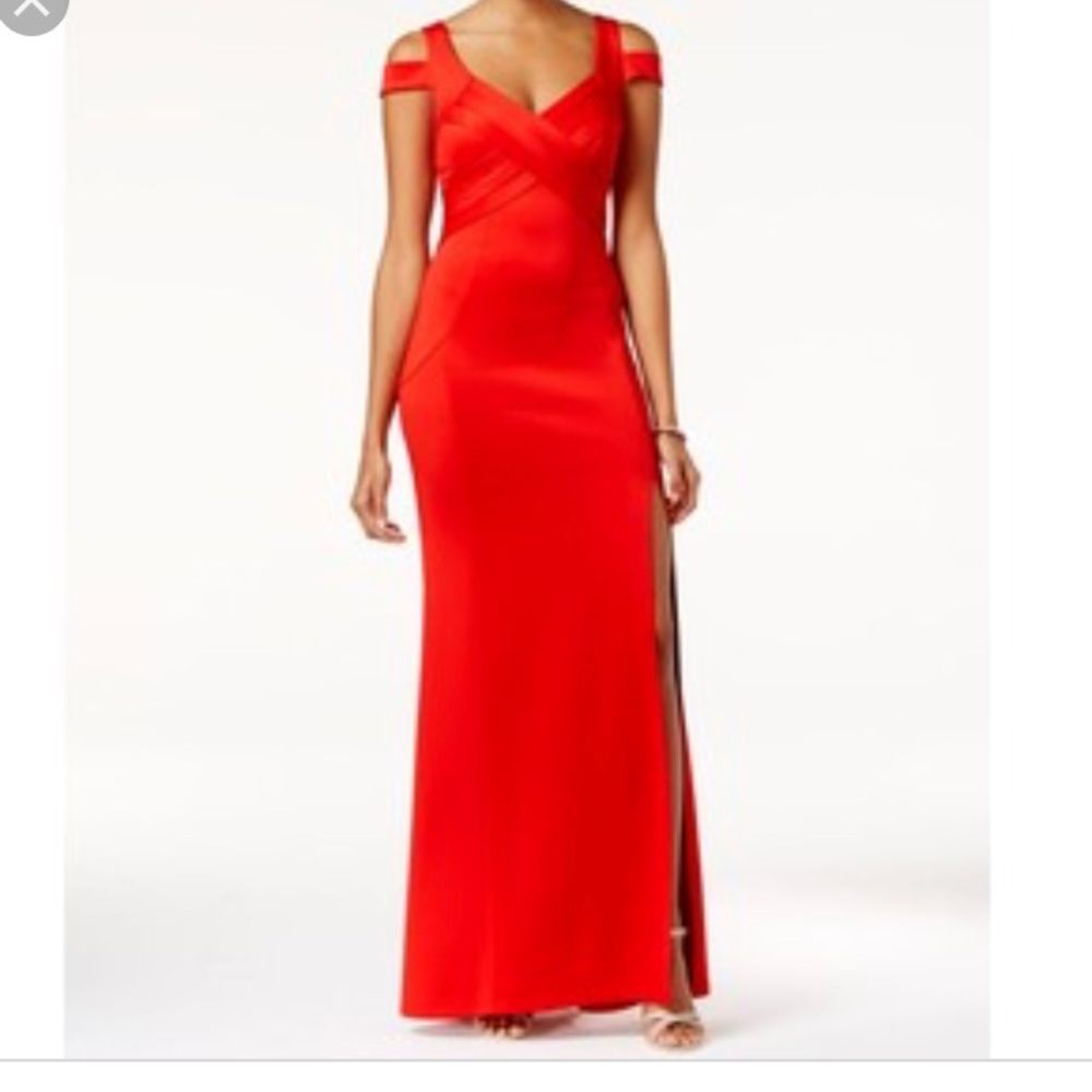 Gorgeous red formal cold shoulder gown.